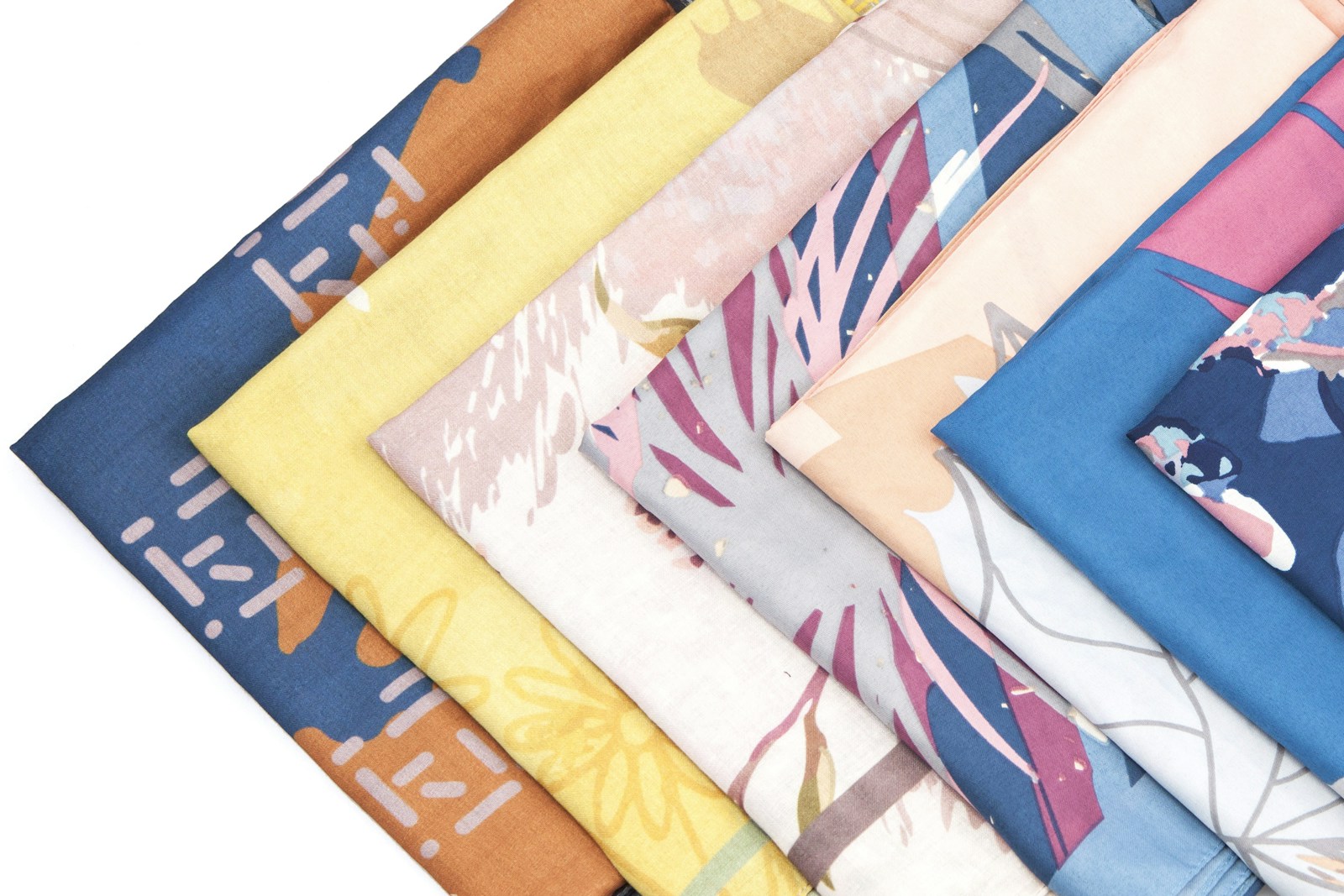 Soft pashmina fabric flatlay in modest wear color story
